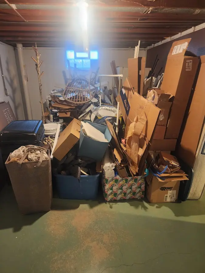 Roll-off dumpster container at job site for Concrete Dumpster Rental in West Orange